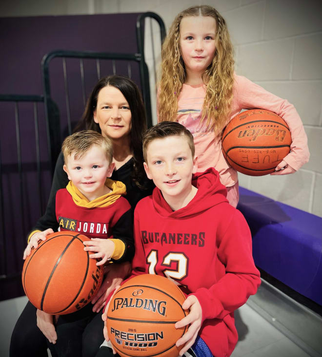 Here they are, the basketball playing Strackes, including (clockwise from upper left) mother Darcy, Lemon (6), Tuff D. (11), and Rook E. (3).