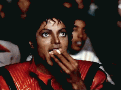 Michael Jackson Watching A Movie And Eating Popcorn GIF