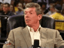 vince-mcmahon-intrigued.gif