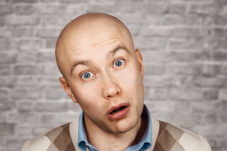 portrait-bald-stupid-surprised-guy-open-mouth-brick-wall-background-144621978.jpg